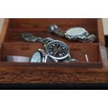 3 Designer wristwatches in wooden trio jewellery box
