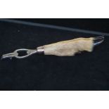 Taxidermy roe deer foot bottle opener