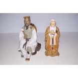2 Oriental Figures