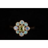 9ct Gold ring set with 8 opals & central green sto