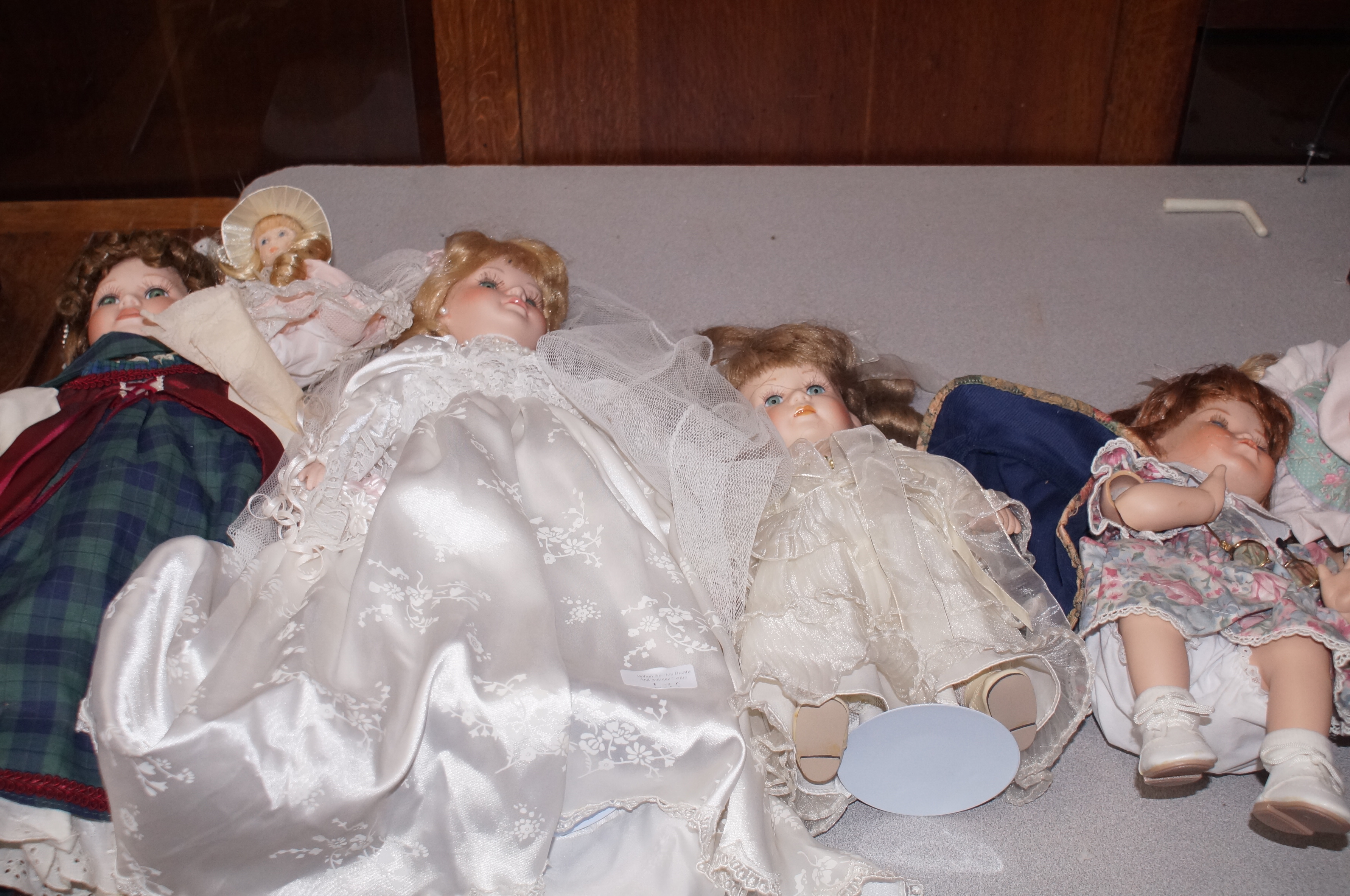 Collection of porcelain headed dolls