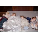 Collection of porcelain headed dolls