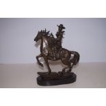 Bronze cowboy on horse, marble base signed Height