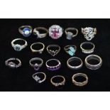 Collection of 18 dress rings, majority silver