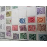 An Album of world stamps & pages of loose stamps