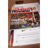 Box of football programs