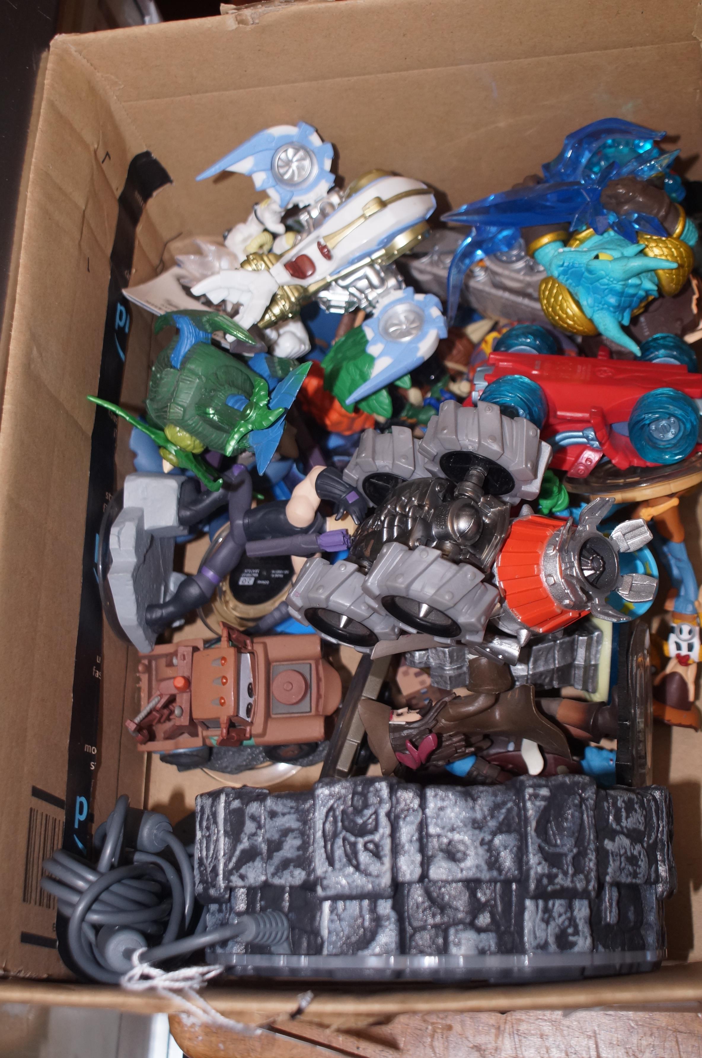 Box of Skylander figures