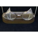 Boxed pair of motorbike spectacles