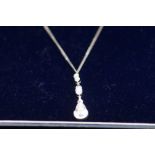 9ct White gold chain & pendant, pendant set with 3