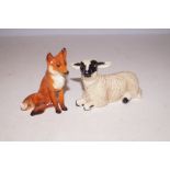 Beswick seated fox & black face ram