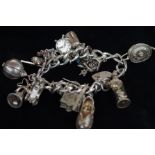 Silver charm bracelet 16 charms