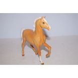 Beswick Palomino trotting pony