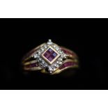 9ct Gold dress ring, set with garnets & chip diamo