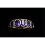 9ct Gold dress ring, set with 5 amethyst Size P