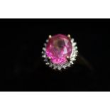 9ct Gold dress ring, set with large pink stone sur
