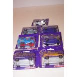 7x Model Cadbury's chocolate vans