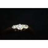 18ct Gold 3 stone Diamond Ring set in platinum Si