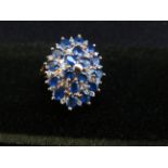 9ct Gold cluster ring set with blue & white stones