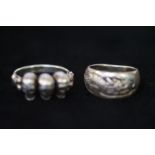 2 Silver Rings (1 Skull & 1 Dragon)