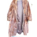 A 3/4 Length Fur Coat