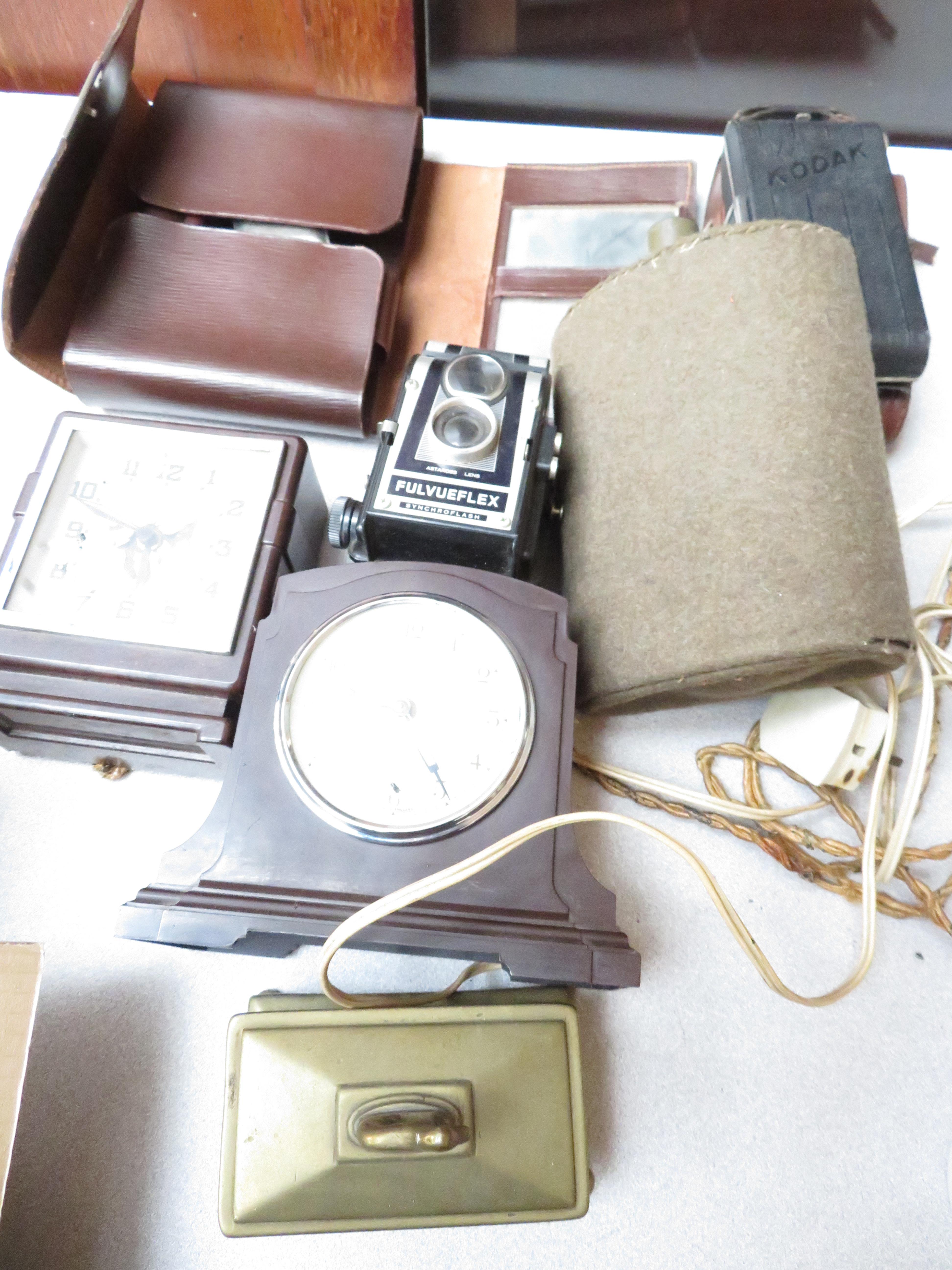 A Ferranti Bakelite Clock together with Cameras a