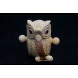 Bone (?) tape measure in the form of an owl