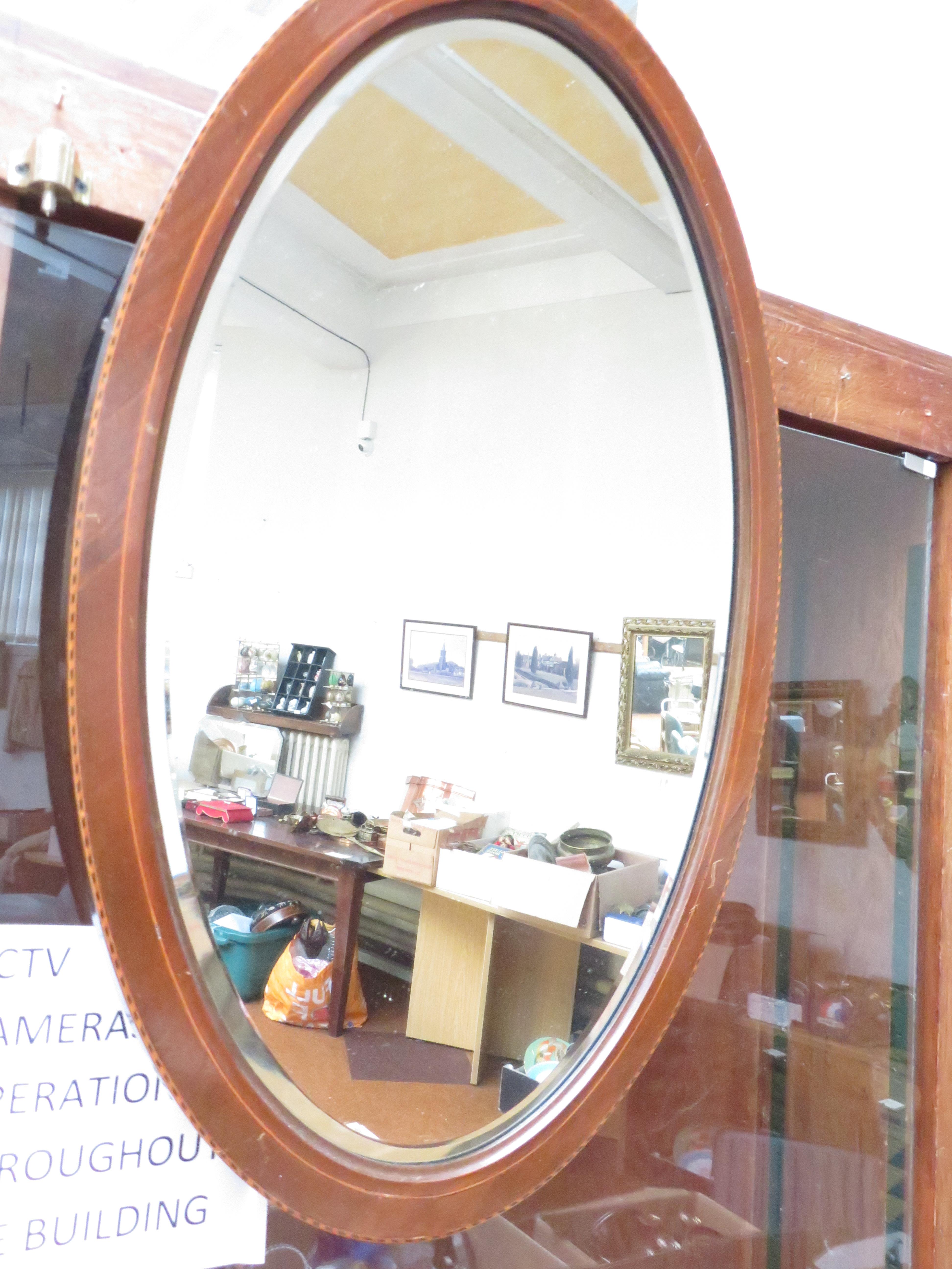 An Edwardian Inlayed Bevelled Mirror