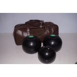A set of Thomas Taylor bowling balls and bag