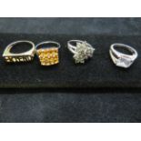 4 silver assorted dress rings