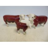 Hereford bull, cow and calf