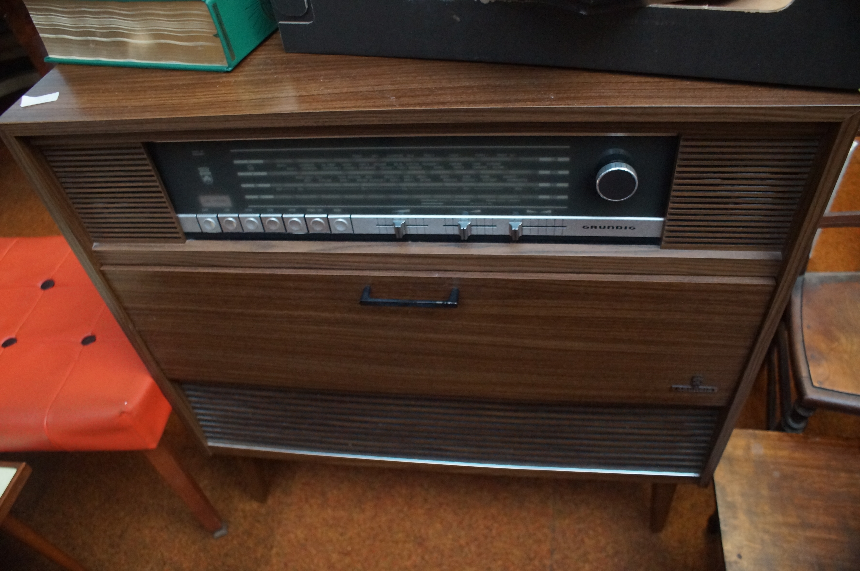 A Grundig teak radiogram, case with a concealed re