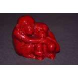 Royal Doulton Flambé paperweight, hugging monkeys.