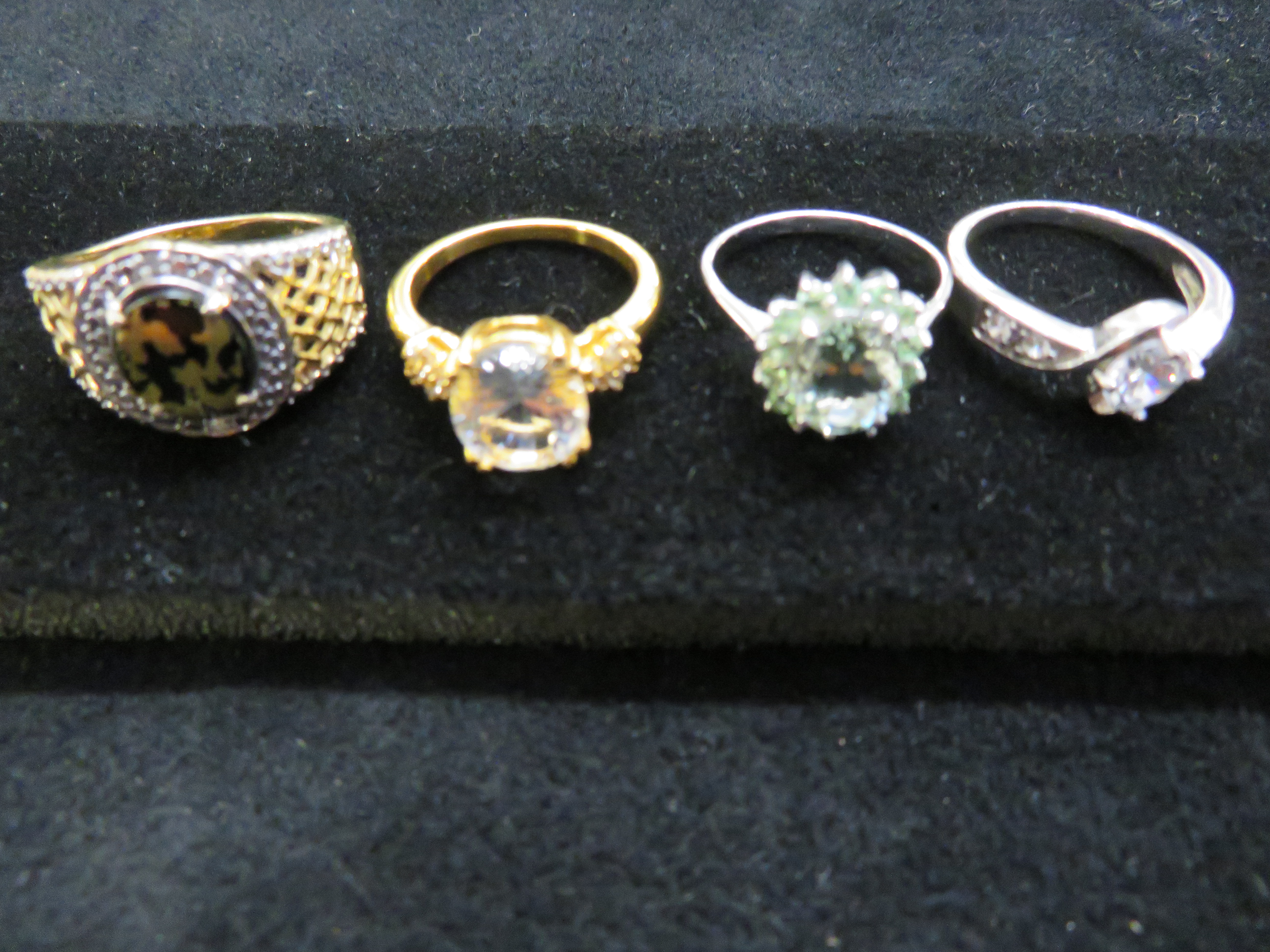 4 silver assorted dress rings