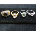 4 silver assorted dress rings