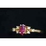 14ct gold ring set with ruby and diamonds, size- L