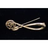 A 9ct gold Mackintosh style pin brooch with origin