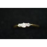 18ct gold and platinum ring set with 3 diamonds Si
