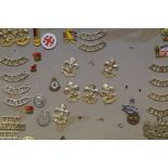 A collection of badges "Kings Regiment" and others