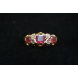 9ct gold ring set with ruby and diamonds, size- N