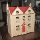 A dolls house with furniture