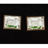 A pair of Art Deco cuff links with dogs