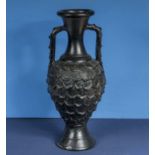 A black pottery vase