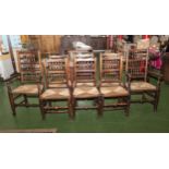 Eight antique Lancashire spindle back chairs.