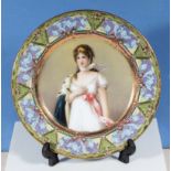 A Continental porcelain cabinet plate depicting a beautiful girl, marks to reverse, 9.5" diameter
