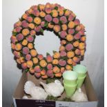 A Thanksgiving wreath together with turkey candles and other items