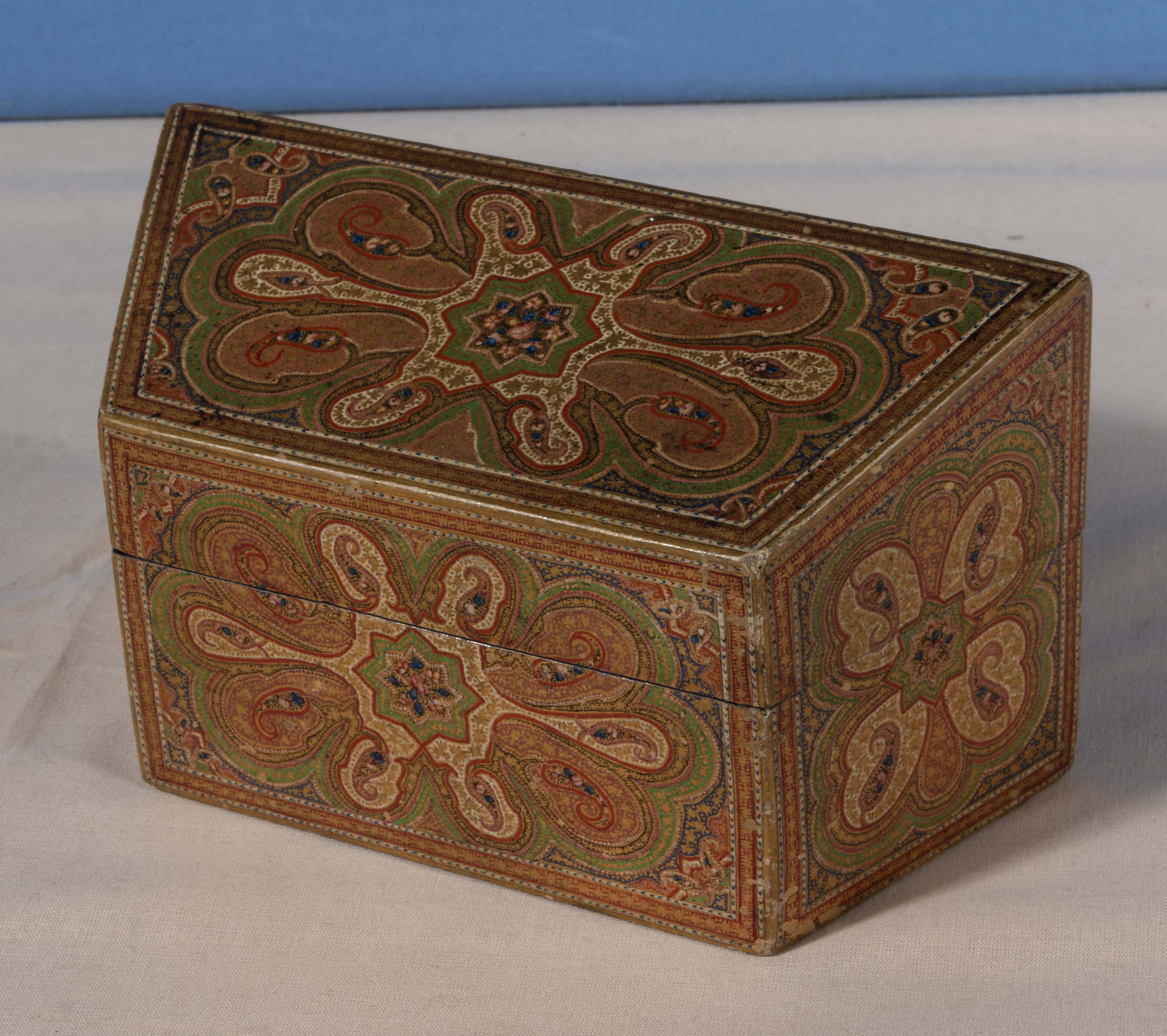 An antique Kashmir lacquered and decorated lidded box