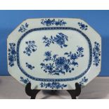 An 18th century Chinese blue and white serving dish of octagonal shape decorated with flowers, 14" x