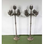 Two metal candle stands