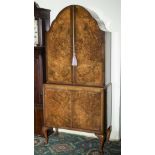 A 20th century walnut cabinet.