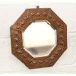 A hexagonal copper Glasgow School of Art wall mirror